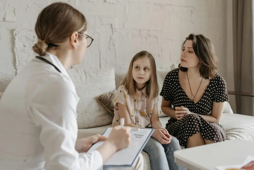 Doctor consulting a patient in a public healthcare center in France under the free medical system